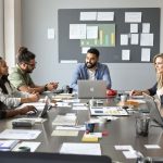 Diverse professionals collaborating in a modern office setting.