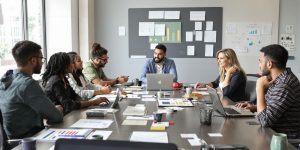 Diverse professionals collaborating in a modern office setting.